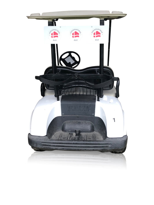 Sign plate with print to the back of a golf cart